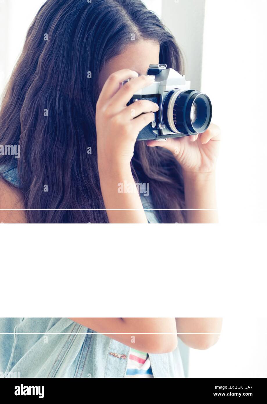 White banner with copy space against woman using digital camera Stock Photo