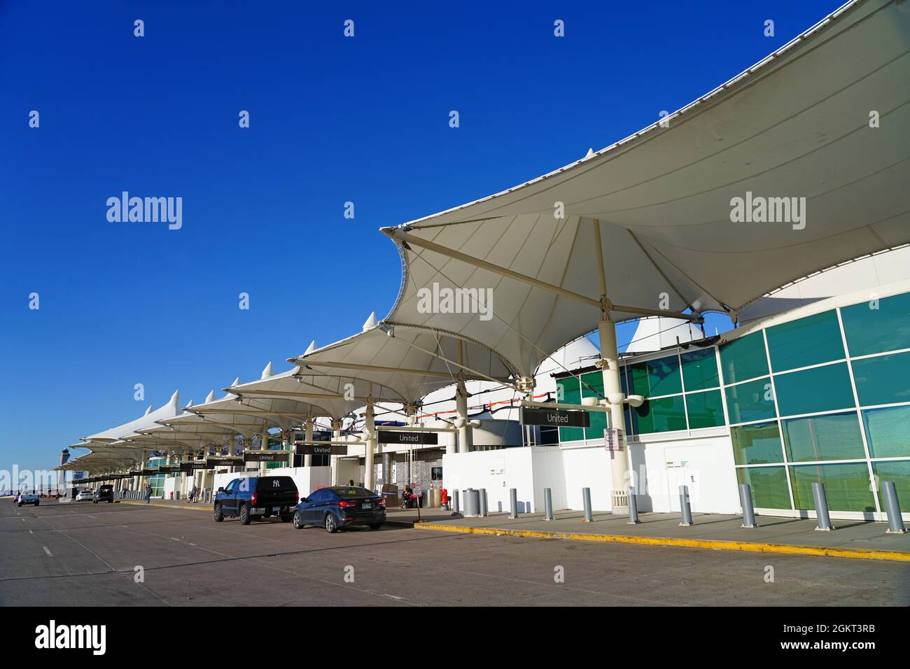 DENVER, CO 10 APR 2021 Exterior view of the Jeppesen Terminal with white tent roof at Denver
