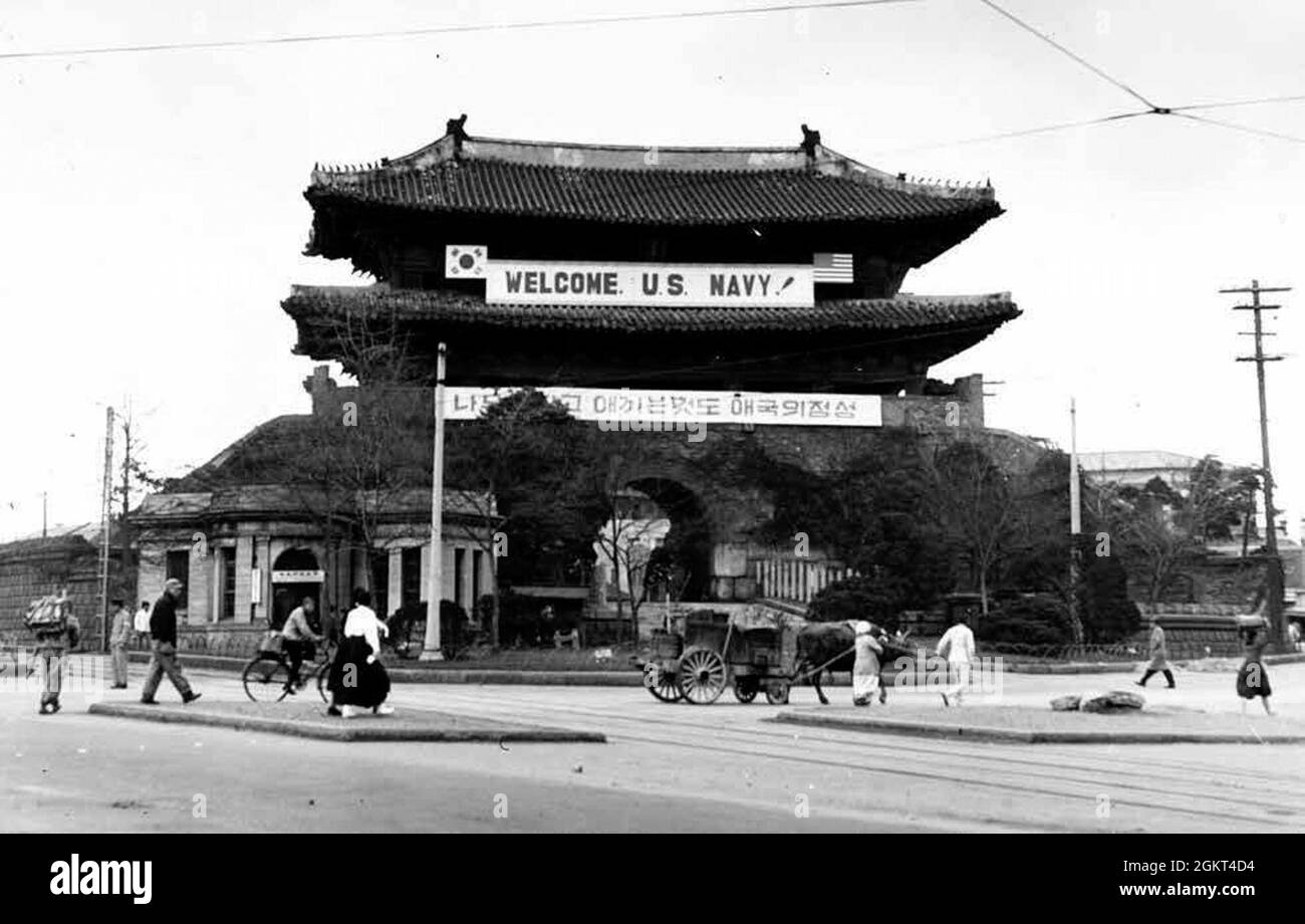 The historic East Gate shown in 1950. Credit: Official U.S. Navy Photograph, from the All Hands collection at the Naval History and Heritage Command. Stock Photo