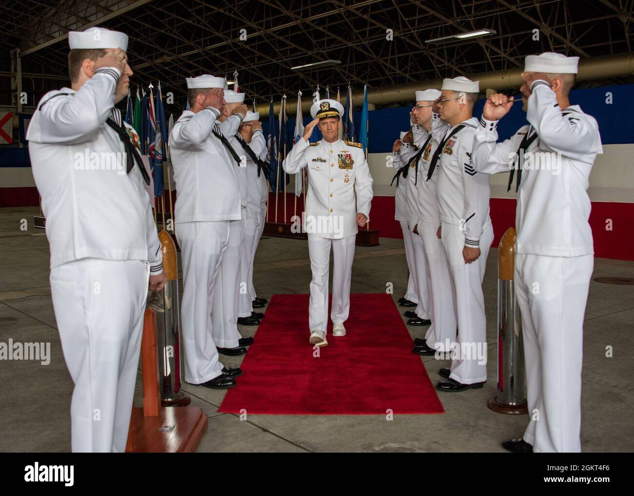 210625-N-DM318-1162 Vice Adm. William R. Merz, Commander, U.S. 7th Fleet walks thru the side boys during a Change of Command for Commander, Task Force 72 onboard Naval Air Facility (NAF) Atsugi, June 25, 2021. Stock Photo