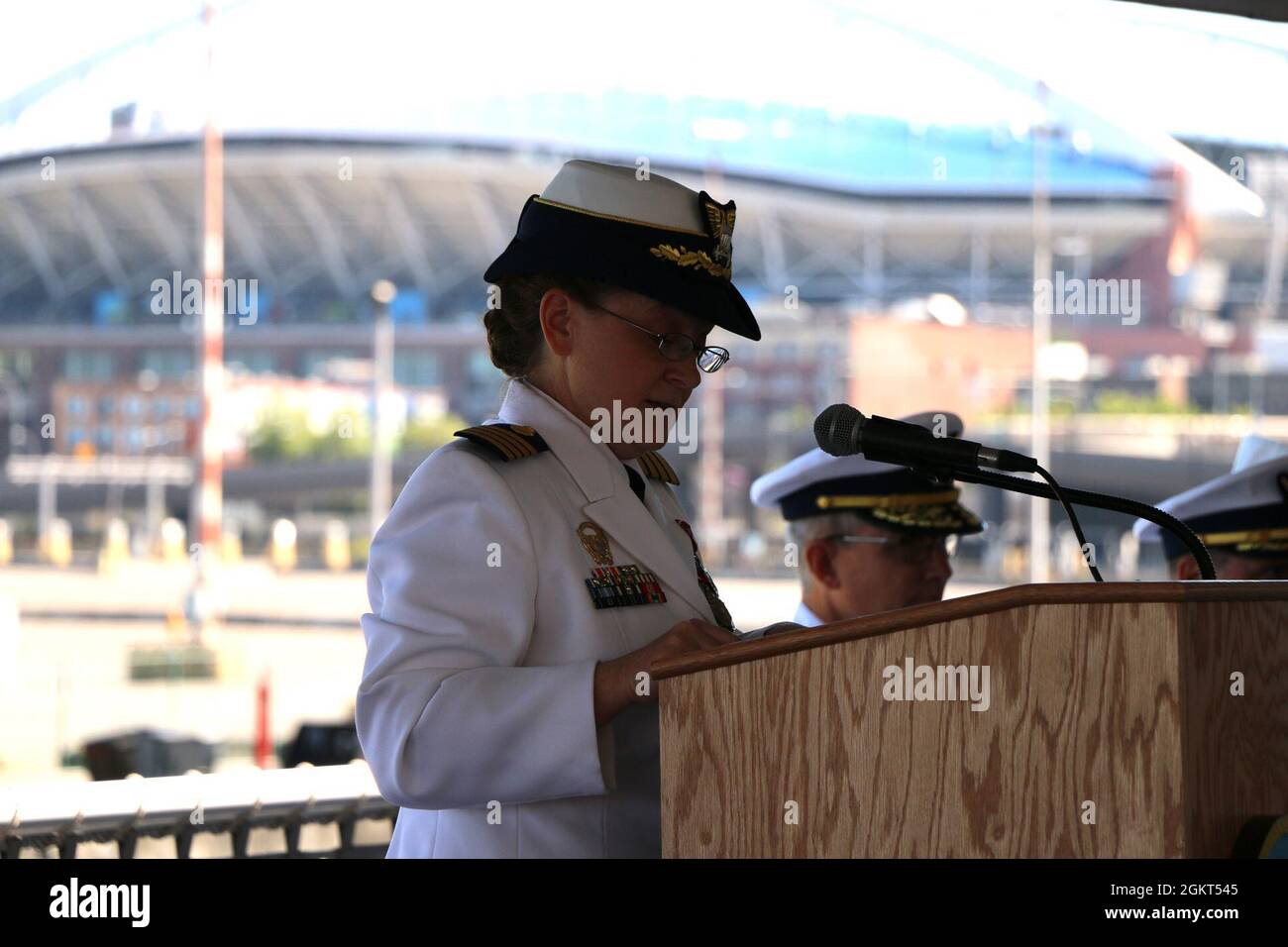 Capt. Mary Ellen J. Durley speaks during the Coast Guard Cutter Healy’s (WAGB 20) change of command ceremony aboard the cutter moored at Base Seattle, June 25, 2021. Capt. Kenneth J. Boda relieved Durley as Healy’s commanding officer during the ceremony. Stock Photo