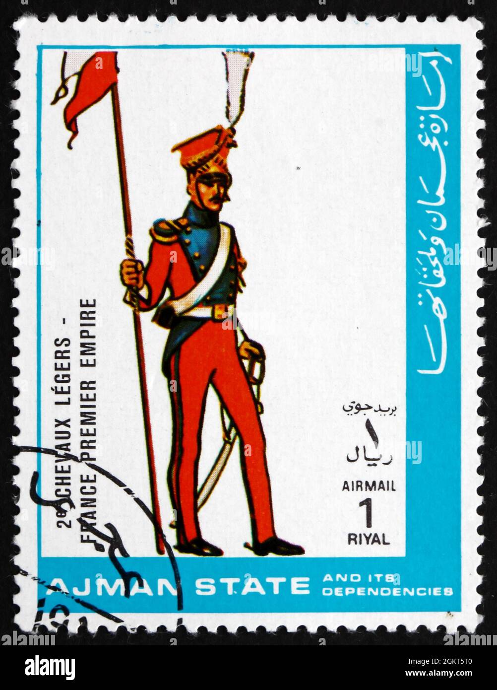 AJMAN - CIRCA 1972: a stamp printed in the Ajman shows Military Uniform of Light Cavalry, France, 1st Empire, circa 1972 Stock Photo