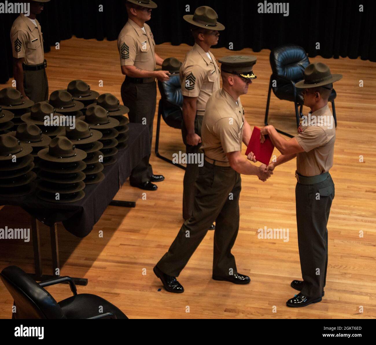 MSgt. Hyuk Kim, with the Republic of Korea Marine Corps, receives the