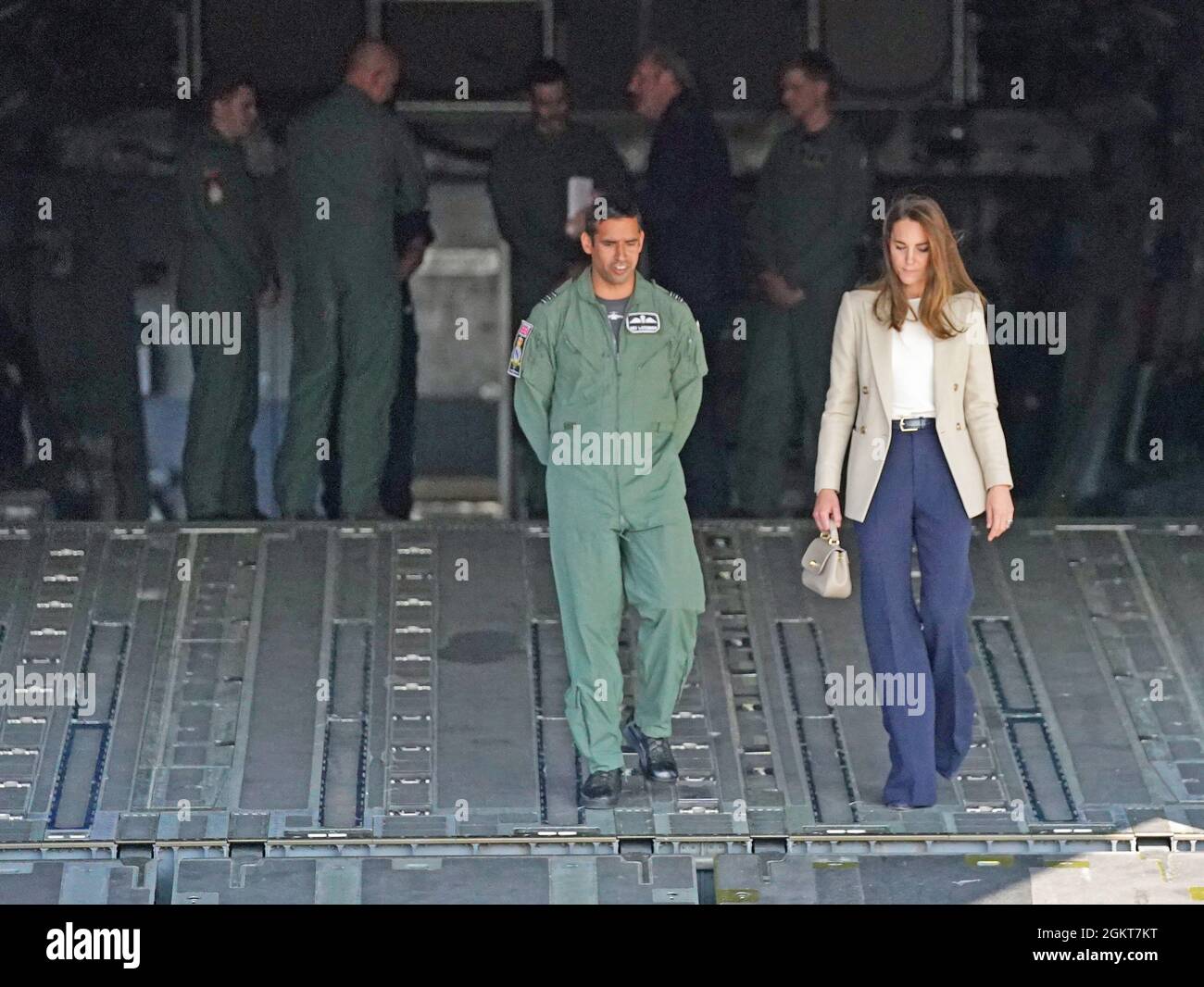 The Duchess of Cambridge walks down the loading ramp of an RAF C17 ...
