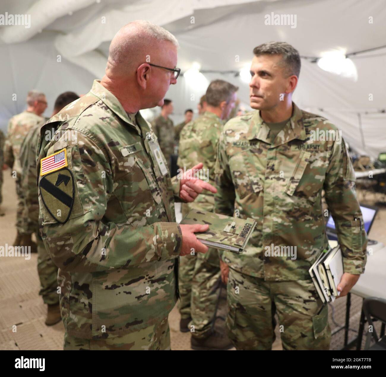 Brig. Gen. Gen. Jeffrey C. Coggin (left), commanding general of the U.S ...