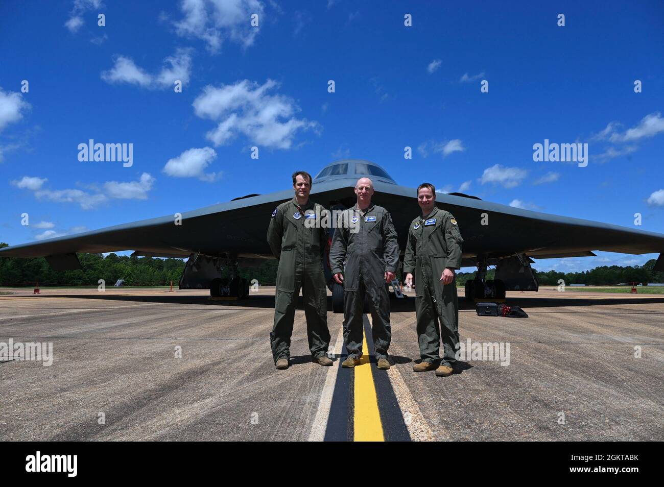 U.S. Air Force Col. Kyle Wilson (Right), 509th Bomb Wing vice commander,  Col. Seth Graham (Middle), 14th Flying Training Wing commander, and Capt.  John Wisocky (Left), 509th Bomb Wing B-2 pilot, pose