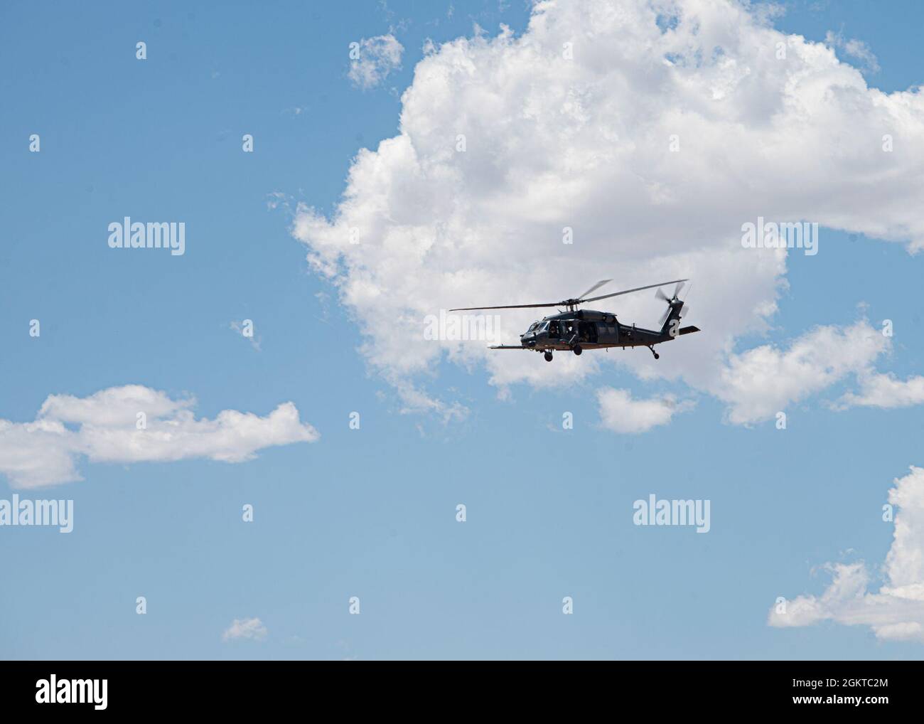 A U.S. Air Force HH-60G Pave Hawk flies over Davis-Monthan Air Force Base, Arizona, June 28, 2021. The HH-60G provides critical rescue airpower through a variety of missions to include personnel recovery and medical evacuation. Stock Photo