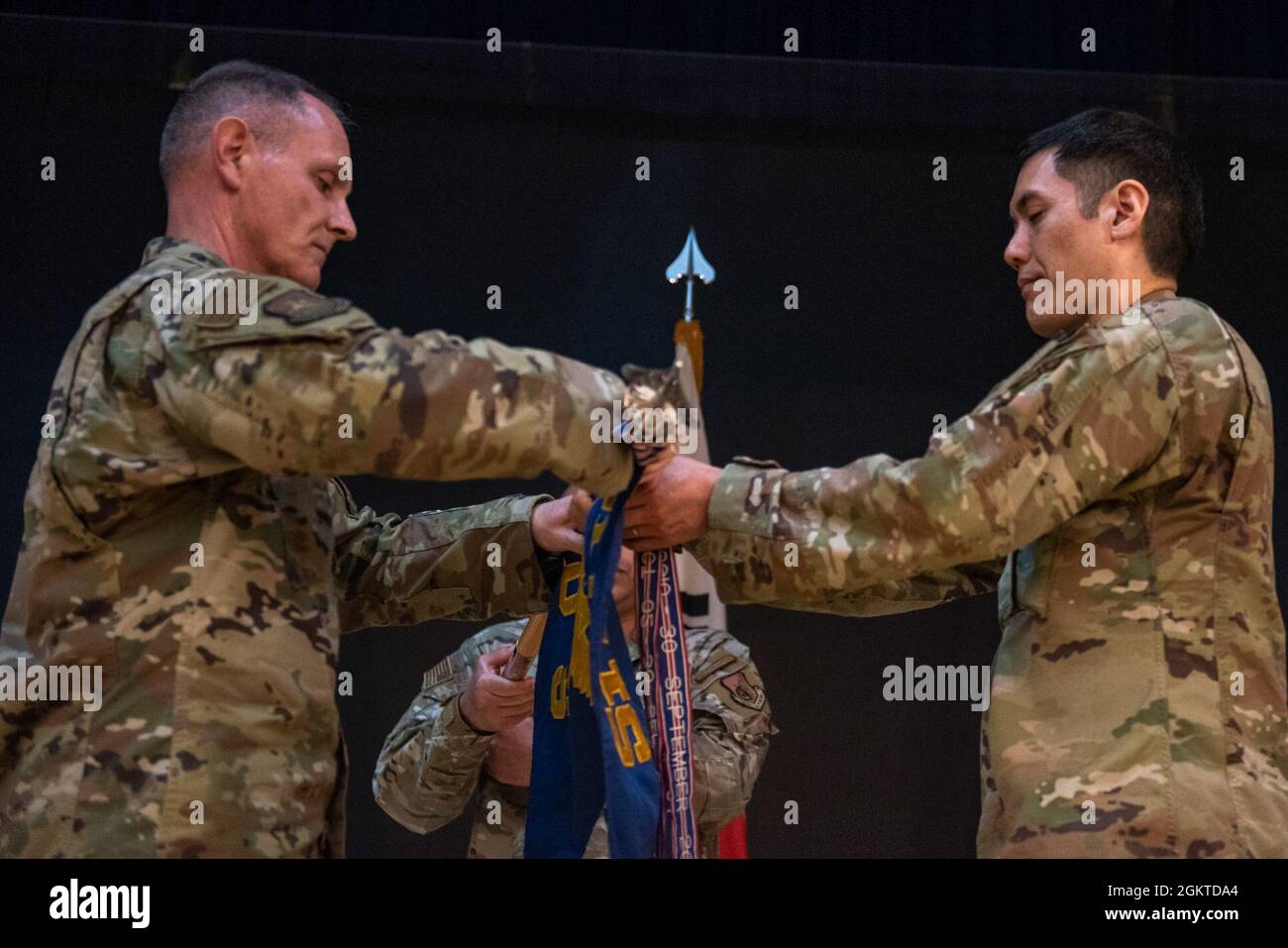 Col. Michael Fea, 51st Medical Group commander, left, and Col. Leon Nieh, 51st Dental Squadron commander, furl the 51st DS squadron flag as part of the deactivation ceremony at Osan Air Base, Republic of Korea, June 28, 2021. Since its inception, the 51st DS served for 22 years under 16 different commanders. Stock Photo
