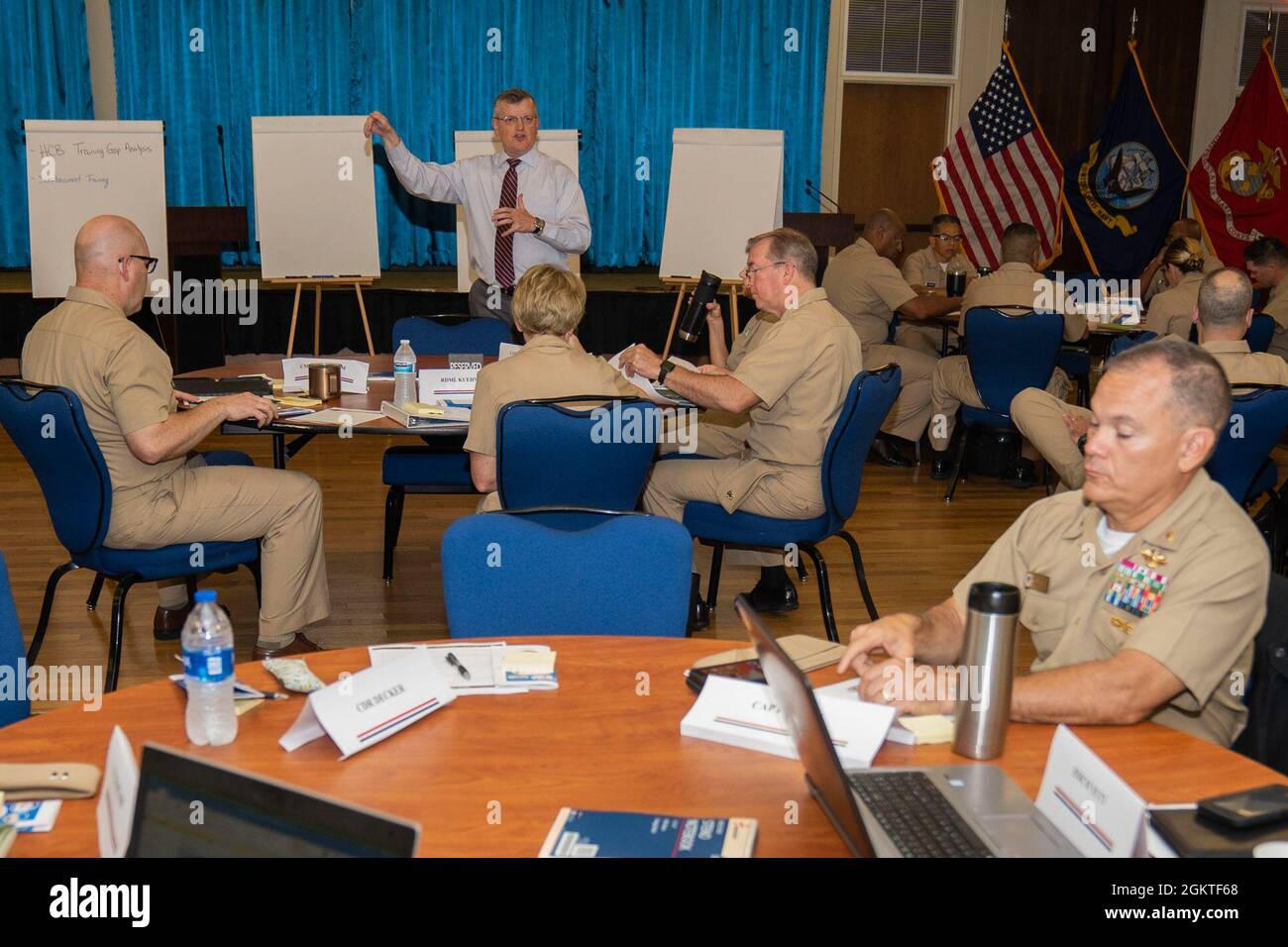 210629-N-IT566-0004 JOINT BASE SAN ANTONIO FT. SAM HOUSTON Dr. Rick Dickinson, chief of staff for Naval Medical Forces Support Command (NMFSC), speaks with attendees of the strategic planning conference hosted by NMFSC about the events of the 2nd day. The conference gathered medical personnel from Naval Medical Forces Atlantic (NMFA), Naval Medical Forces Pacific (NMFP), and the Marine Corps gathered to identify issues and plan for future training of Navy Medicine personnel. Stock Photo