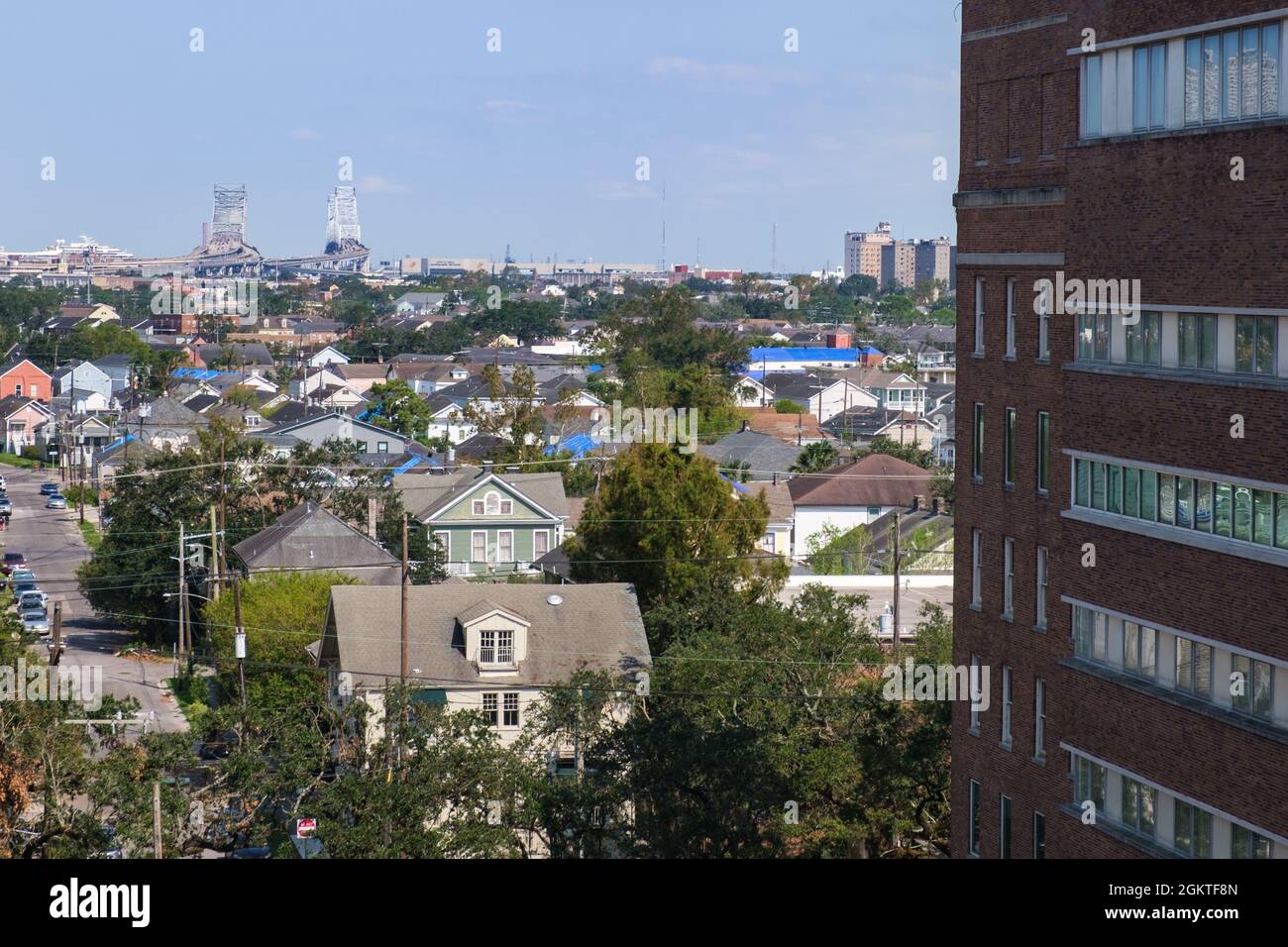 NEW ORLEANS, LA, USA - SEPTEMBER 11, 2021: Aerial view of Uptown Neighborhood in the aftermath of Hurricane Ida showing damaged roofs with blue tarps Stock Photo