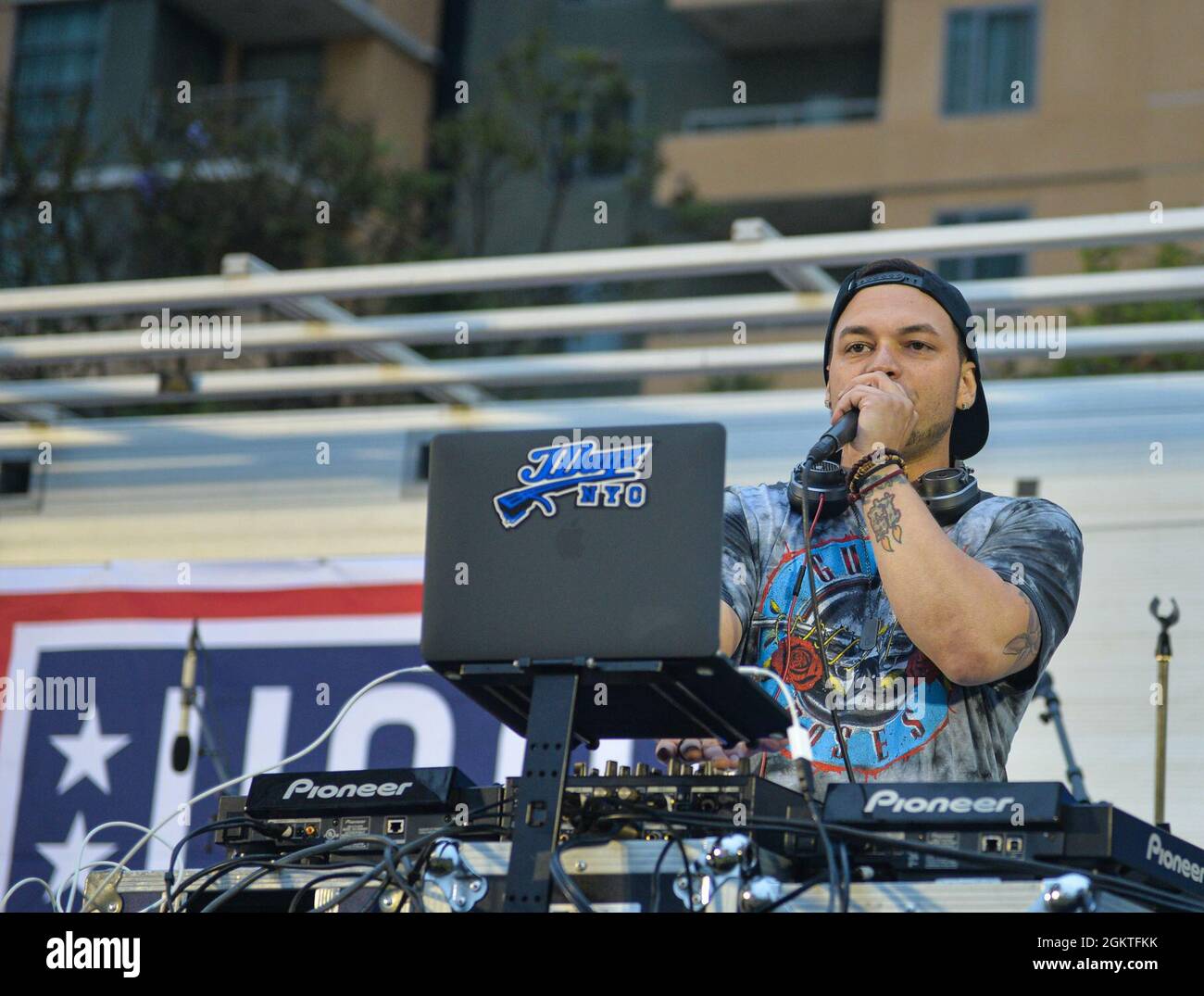 210629-N-MJ716-0178 NAVAL BASE SAN DIEGO (June 29, 2021) DJ J. Dayz performs at the USO Summer tour show held at the Pacific Beacon courtyard on Naval Base San Diego. The USO Summer Tour show consisted of entertainers, singers and comedians dedicating their time to lifting the spirits of our military at various bases across the country. Stock Photo