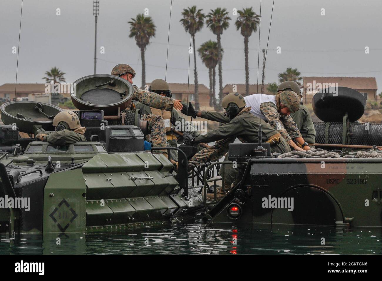 U.S. Marines with Co. A, 1st Battalion, 5th Marine Regiment, 1st Marine Division (1st MARDIV) and Co. B, 3d Assault Amphibian Battalion, 1st MARDIV, conduct water operations training at Marine Corps Base Camp Pendleton, California, June 29, 2021. The training was conducted to ensure Marines are proficient with safety procedures for water operations. Stock Photo