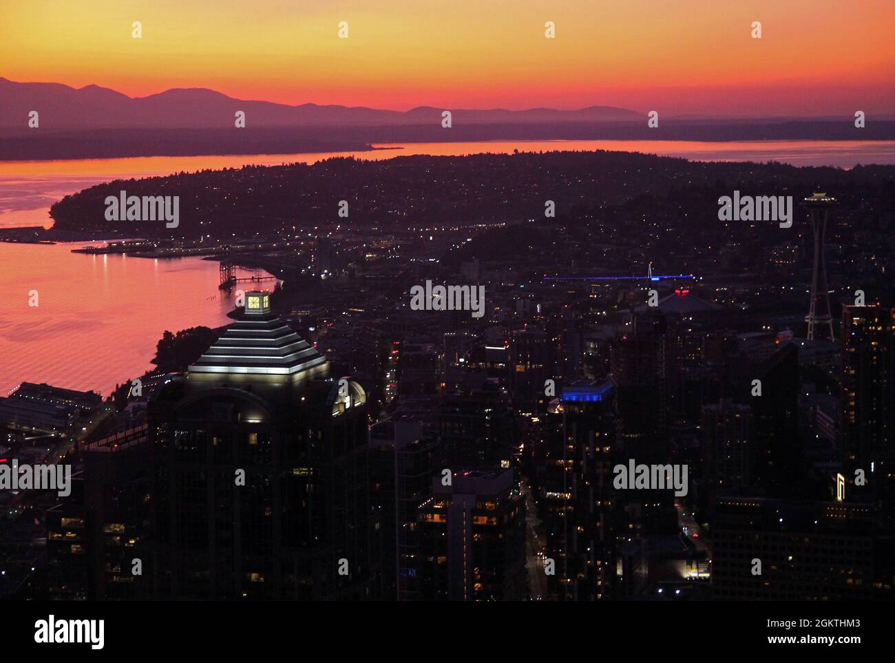 Intense sunset over Seattle from the top of a skyscraper in Washington state Stock Photo
