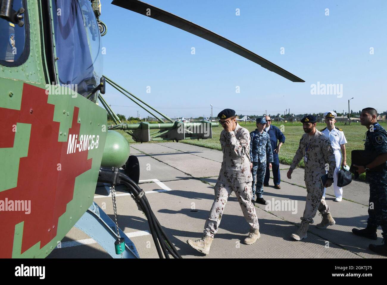 210630-N-VP310-0022  ODESA, Ukraine (June 30, 2021) Egyptian, United Arab Emirates, Canadian and Turkish military officers board a Ukrainian Mi-8 Helicopter to attend an air demonstration for Exercise Sea Breeze 2021 Odesa, Ukraine, June 30, 2021. Exercise Sea Breeze is a multinational maritime exercise cohosted by the U.S. Sixth Fleet and the Ukrainian Navy since 1997. Sea Breeze 2021 is designed to enhance interoperability of participating nations and strengthens maritime security and peace in the region. Stock Photo