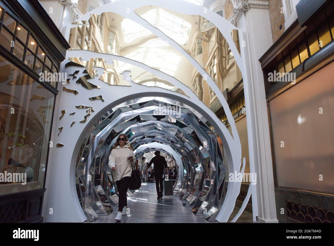 London, UK, 15 September 2021: With the new James Bond film No Time to Die set to be released in UK cinemas on 30 September, Mayfair's Burlington Arcade has got into the mood with a mirrored tunnel and gold 007 signage. After repeated delays to the release cinemas are hoping the high-profile film will bring audiences back into cinemas. Anna Watson/Alamy Live News Stock Photo