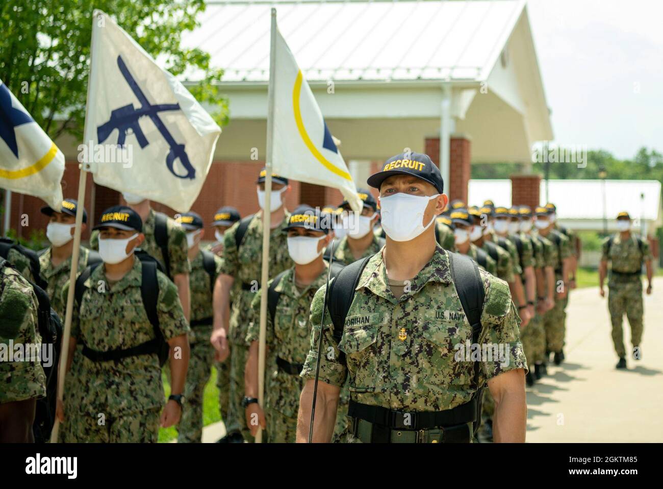 A recruit division marches in formation at Recruit Training Command. More than 40,000 recruits train annually at the Navy’s only boot camp. Stock Photo