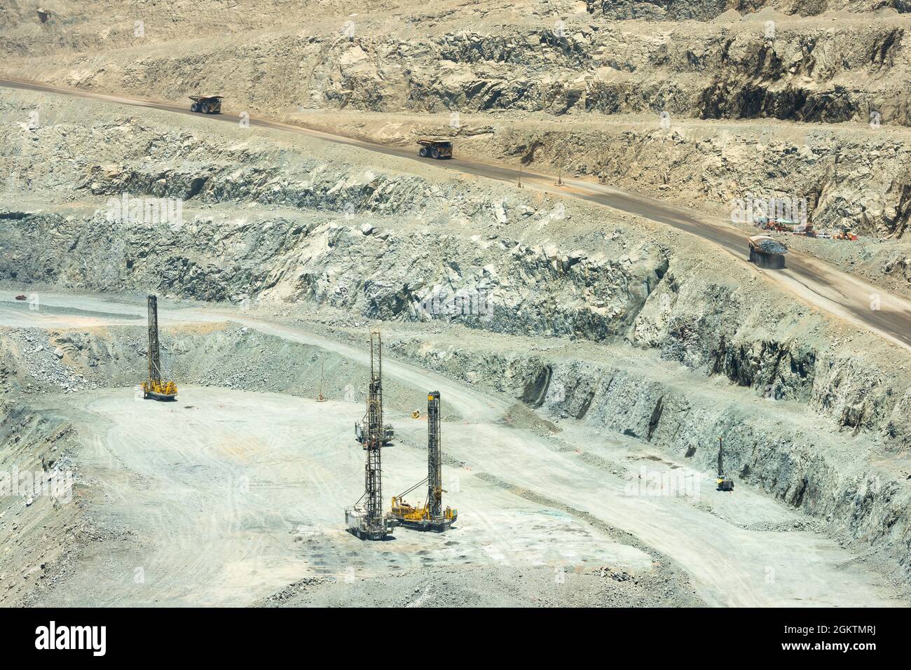 Blasthole drill in an open pit copper mine operation in Chile Stock Photo