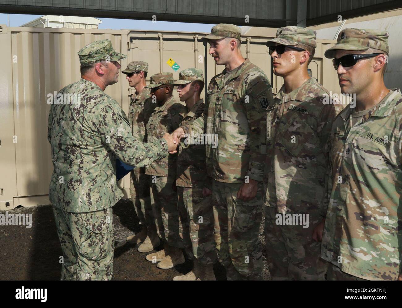 U.S. Coast Guard Cmdr. Benjamin Lehrfeld, commander of Task Group 68.6 ...