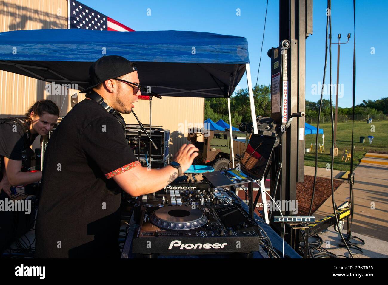 DJ J. Dayz performs on stage during the USO Summer Tour, July 1, 2021, at Joint Base San Antonio-Lackland, Texas. The USO brings shows to hundreds of thousands of American service members around the world. This is the first in-person event since the beginning of the COVID-19 pandemic impacted U.S. service members worldwide. Stock Photo