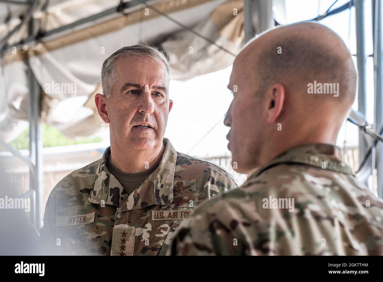 U.S. Air Force Col. Mason Dula, Special Warfare Training Wing commander briefs Gen. John. E. Hyten, vice chairmen of the Joint Chiefs of Staff, on the Special Warfare preparatory class during the 2021 U.S.O Tour at Joint Base San Antonio-Chapman Training Annex, Texas Jul. 1, 2021. Stock Photo
