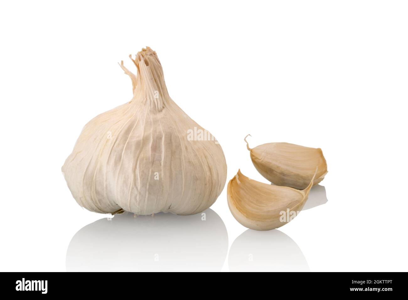 Garlic head with two garlic cloves isolated on white background Stock