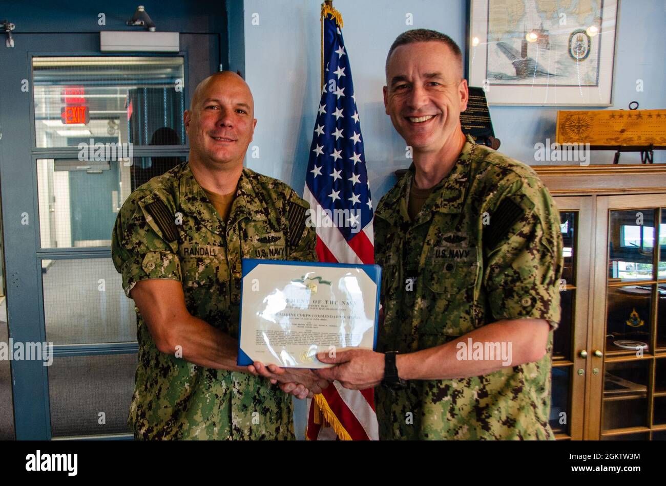 Yeoman Submarine Master Chief Bryan Randall receives a Navy and Marine ...