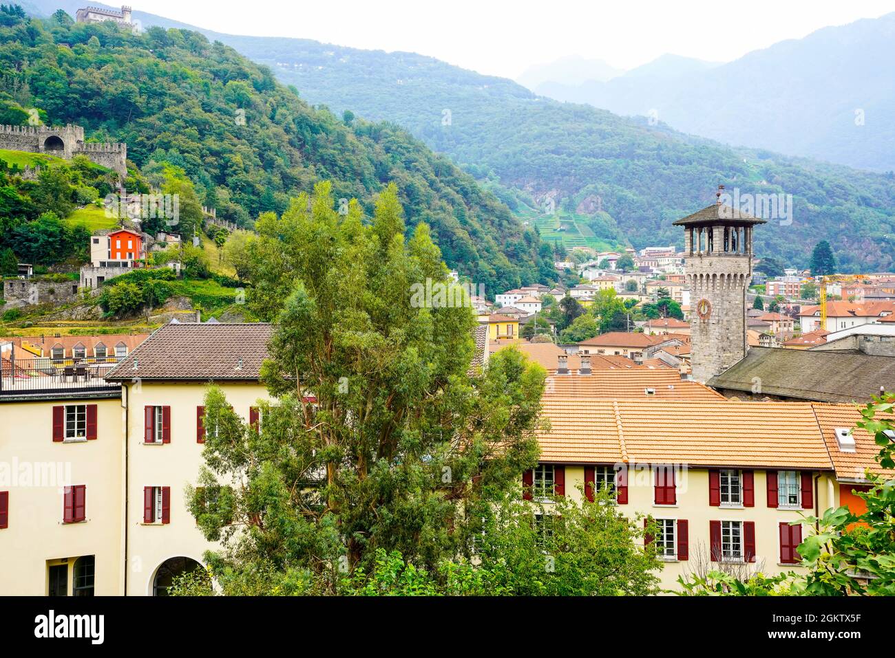Elevated view of Old Town Bellinzona and Palazzo Civico. Bellinzona is a municipality, a historic Swiss town and the capital of the canton of Ticino i Stock Photo