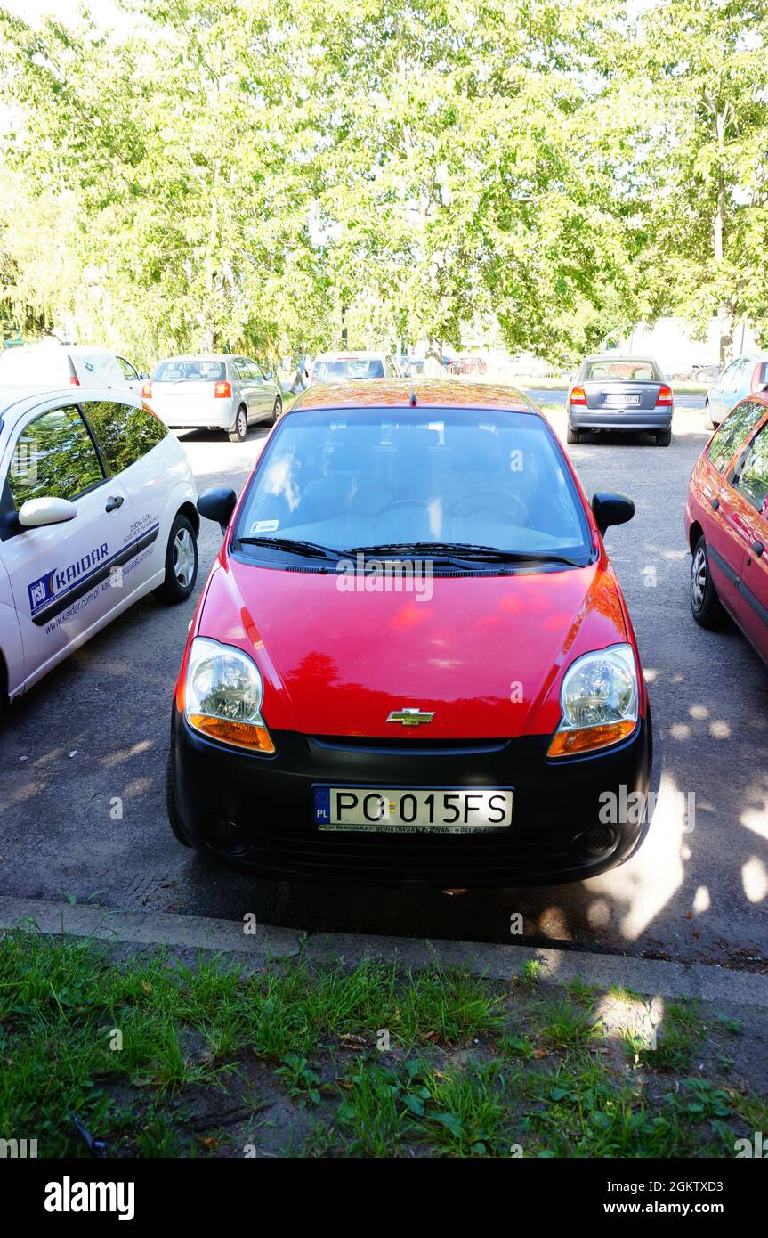 POZNAN, POLAND - Aug 12, 2021: A red Chevrolet Spark car on a parking lot in the Stare Zegrze district, Poznan, Pol Stock Photo