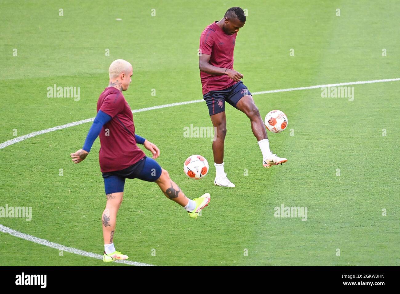 Antwerp's Ally Samata Mbwana and Antwerp's Radja Nainggolan pictured in action during a training session of Belgian soccer team Royal Antwerp FC, Wedn Stock Photo