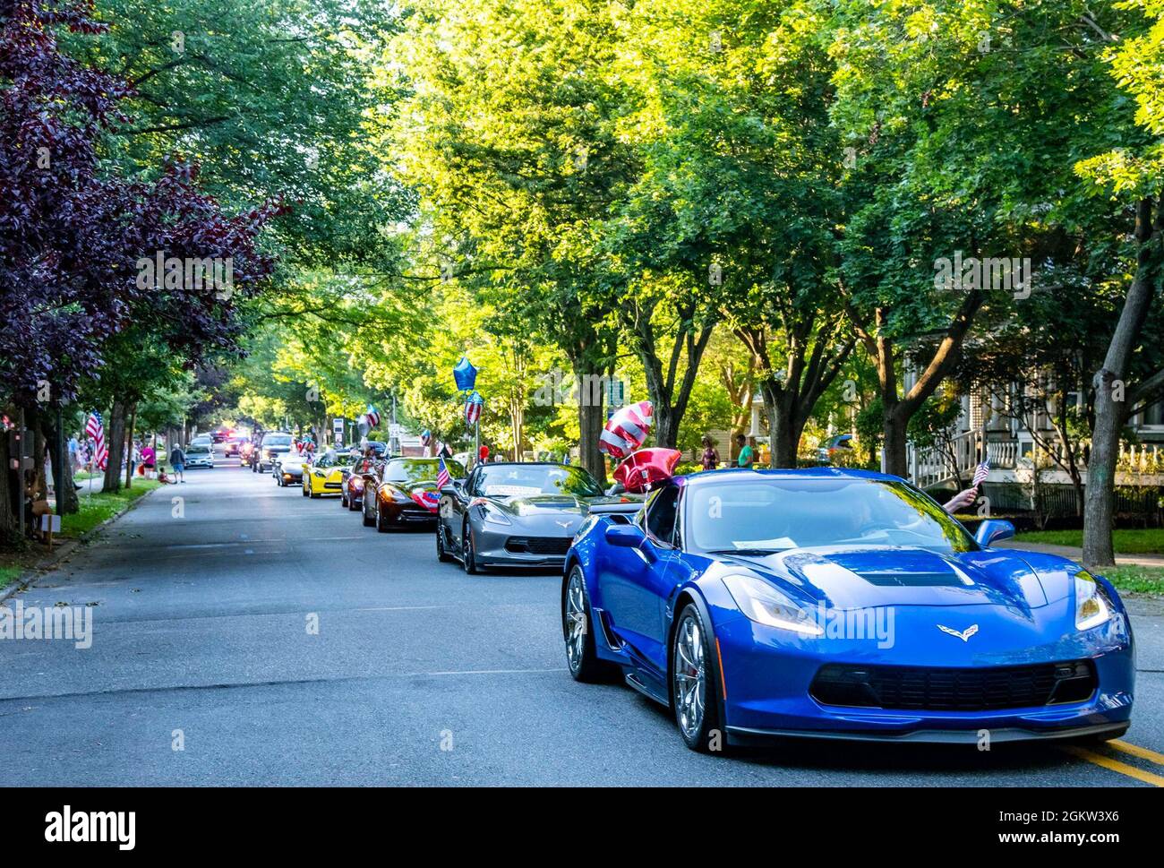 A line of Corvettes drive in the annual Fourth of July Celebration parade in Dover, Delaware, July 4, 2021. The celebration also included a reading of the Declaration of Independence, tours of the Old State House, musical entertainment and a fireworks display. Stock Photo