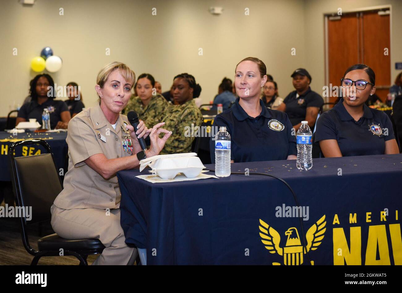 210708-N-VH839-1031 HOUSTON (July 8, 2021) Cmdr. Mary Decker, left 