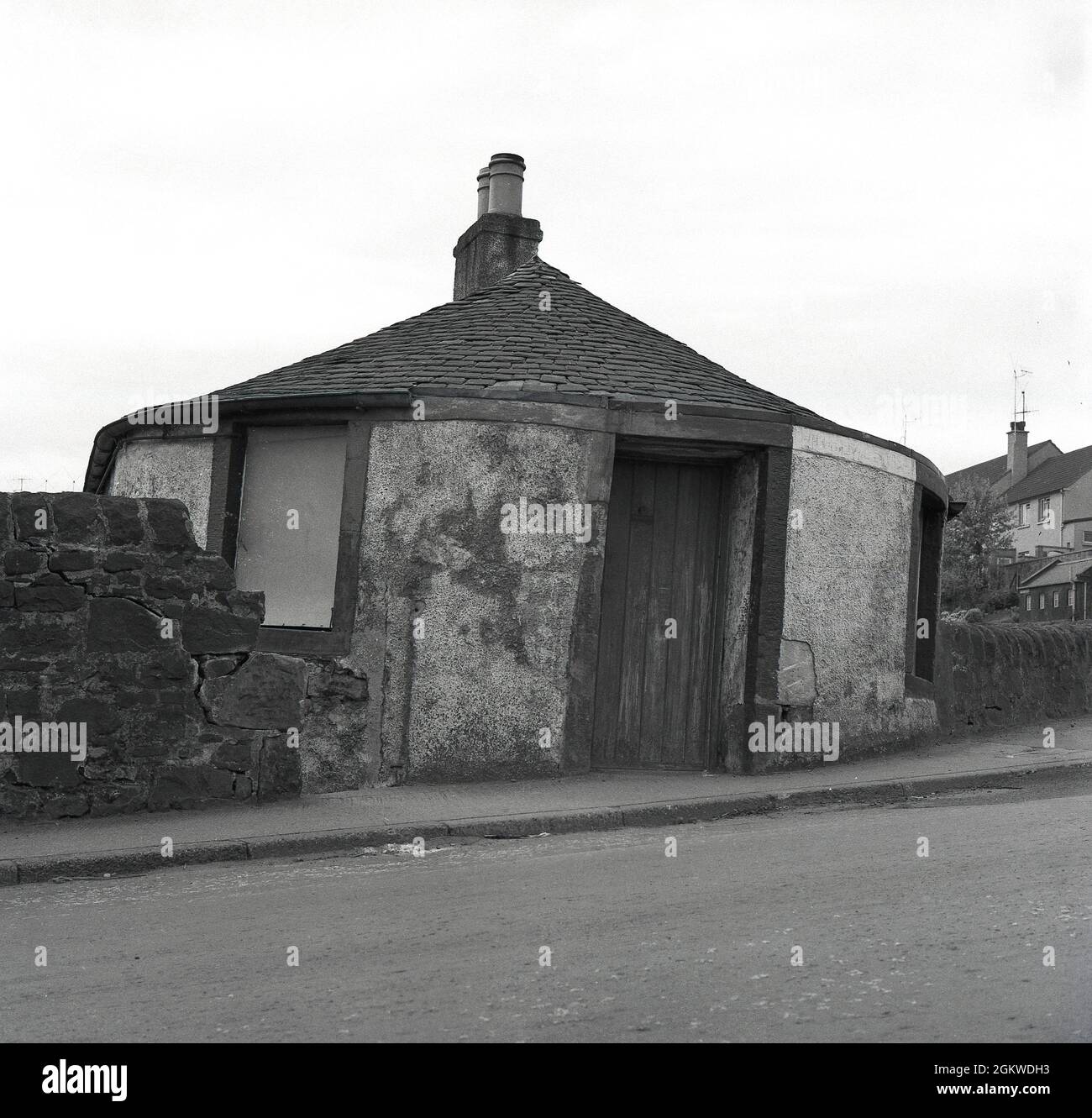 1960s, historical, beside a road, an abandoned old building, Kelty, Fife, Scotland, UK, possibly