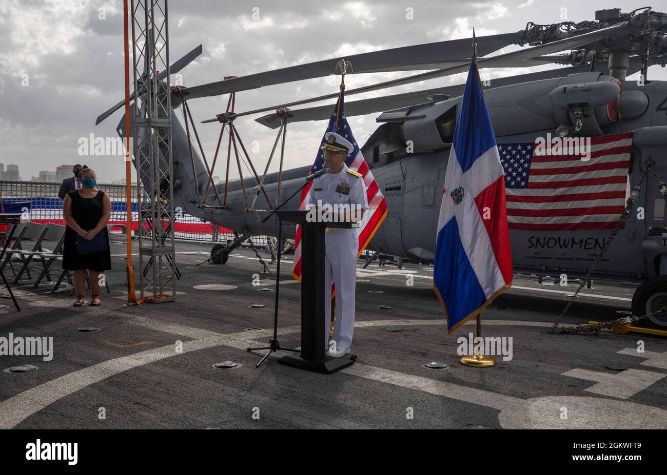 210709-N-KY668-1293   SANTO DOMINGO, Dominican Republic - (July 9, 2021) – Rear Adm. Don Gabrielson, commander of U.S. Naval Forces Southern Command/U.S. 4th Fleet, gives remarks during a reception on the flight deck aboard the Freedom-variant littoral combat ship USS Billings (LCS 15), July 9, 2021. Billings conducted a three-day port visit in Santo Domingo, Dominican Republic, and the ship hosted a reception aboard for government and military leaders. Billings is deployed to the U.S. 4th Fleet area of operations to support Joint Interagency Task Force South’s mission, which includes counter- Stock Photo