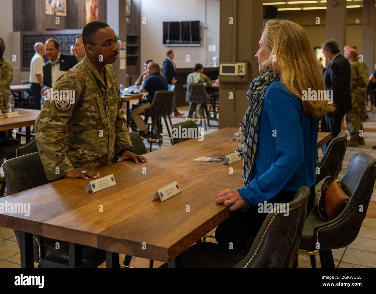 Virginia Rep. Abigail Spanberger speaks with Capt. Colby Felton, 379 Air Expeditionary Wing chaplain, during a Congressional Delegation visit to Al Udeid Air Base, Qatar, July 9, 2021. Spanberger, along with other representatives from various states and districts, met with their constituents to learn more about their service and their lives back home, as well as address any concerns they may have. Stock Photo