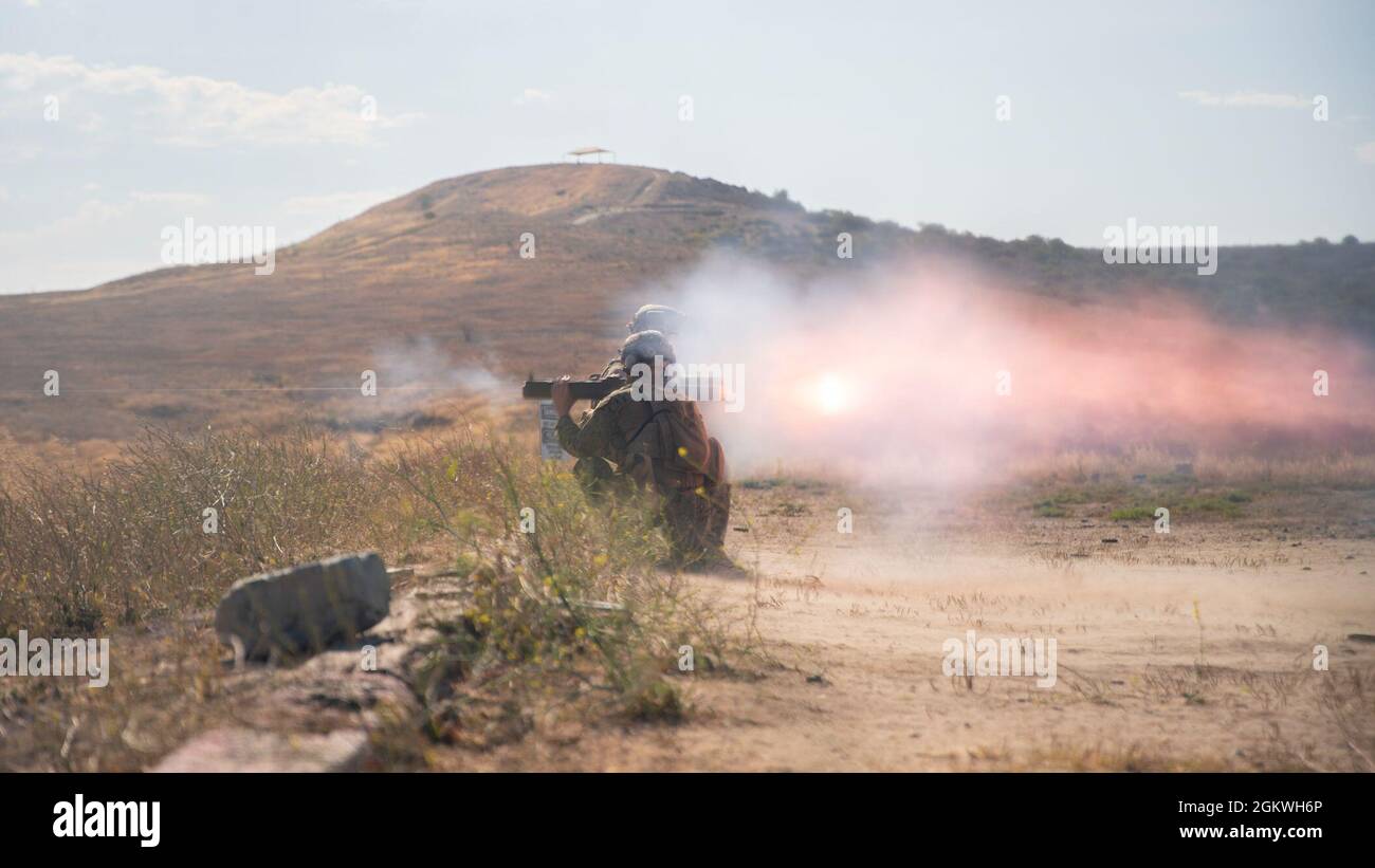 U.S. Marines with Battalion Landing Team 1/1, 11th Marine Expeditionary Unit, fire an M72 light anti-armor weapon during a live-fire range at Marine Corps Base Camp Pendleton, California, July 9, 2021. During the range, Marines from each company in the Ground Combat Element fired various direct and indirect fire weapon systems to maintain operational readiness in preparation for an upcoming deployment with the 11th MEU. Stock Photo