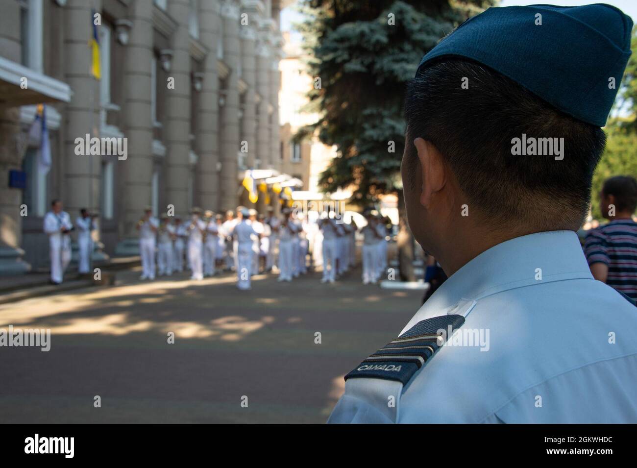 210710-F-D0094-667 ODESA, Ukraine (July 10, 2021) The Canadian Armed Forces (CAF) Contingent members for Exercise SEA BREEZE 21 participate in the closing ceremony in Odesa, Ukraine on July 10, 2021. From June 28 to July 10, 2021, Exercise SEA BREEZE 21 has seen more than 30 participating countries, 32 ships, 40 aircraft, approximately 5,000 troops and 18 special operations and dive teams. This annual exercise, co-hosted by the United States Navy and the Ukrainian Navy, is about training together and making new friends based on a shared commitment to peace and stability in Europe. The CAF dele Stock Photo