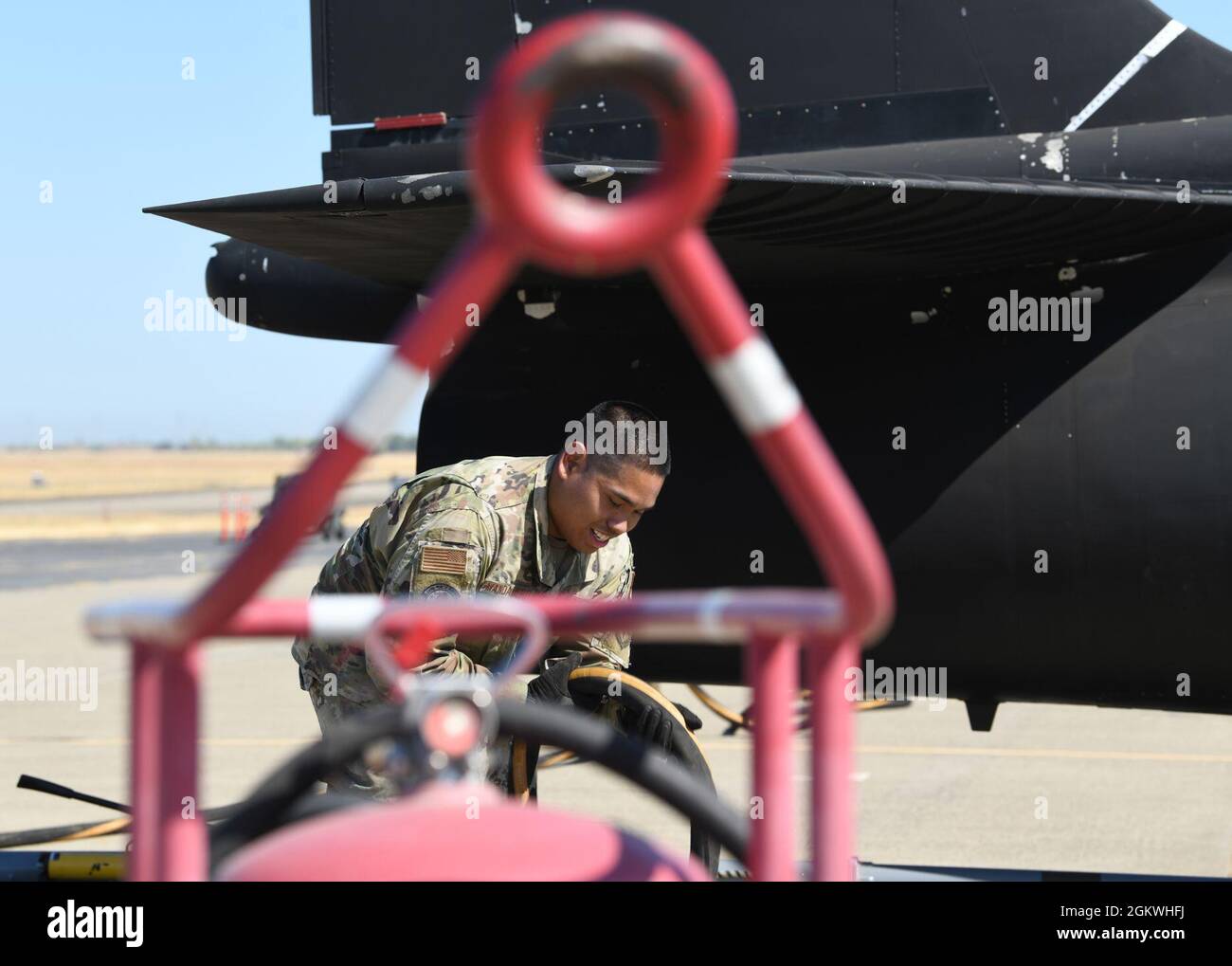 Staff Sgt. Peter John Mandadero, 9th Logistics Readiness Squadron Immediate Response Force team member, prepares fuel hoses for a U-2 Dragon Lady during an exercise to test out the Tactical Aviation Ground Refueling System, July  9, 2021, at Beale Air Force Base, California. The new system being tested proved highly effective by taking less than 14 minutes to set up. Stock Photo