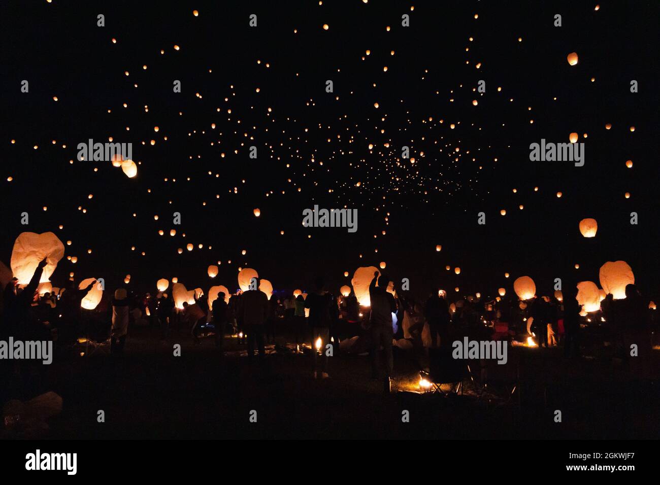 People sending off their floating lanterns at the end of a floating