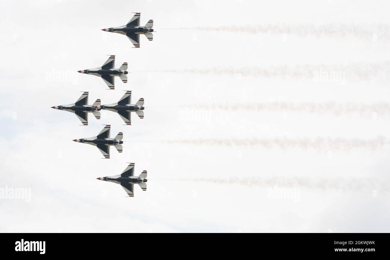 The U.S. Air Force Air Demonstration Team, The Thunderbirds, perform at the Dayton Air Show on July 10, 2021, at Dayton International Airport. The Thunderbirds version of the delta, shown here, put the fighter aircraft as close as 18 inches apart from each other flying at roughly 500 miles per hour. Stock Photo