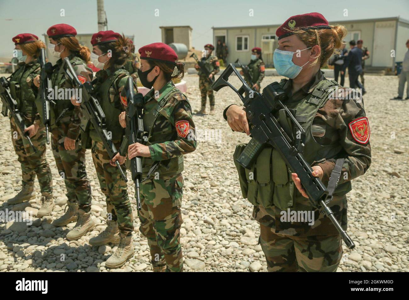 Peshmerga female soldiers run through squad movement drills at the ...