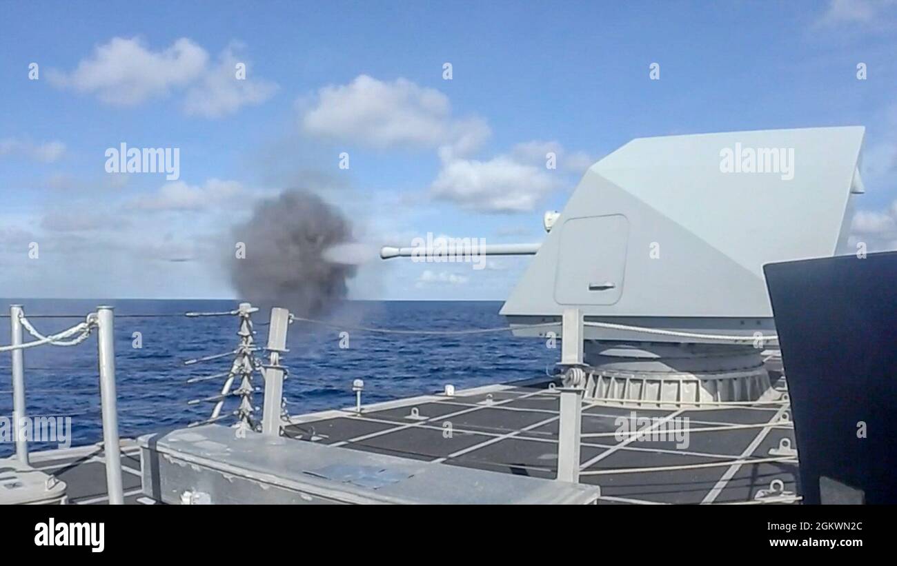 210712-N-WU807-1063 SOUTH CHINA SEA (July 11, 2021) The Mk 110 57mm Gun Weapons System (GWS) is fired as part of a regular operational exercise aboard Independence-variant littoral combat ship USS Charleston (LCS 18), July 11. Charleston, part of Destroyer Squadron Seven, is on a rotational deployment, operating in the U.S. 7th Fleet area of operations to enhance interoperability with partners and serve as a ready-response force in support of a free and open Indo-Pacific region. Stock Photo