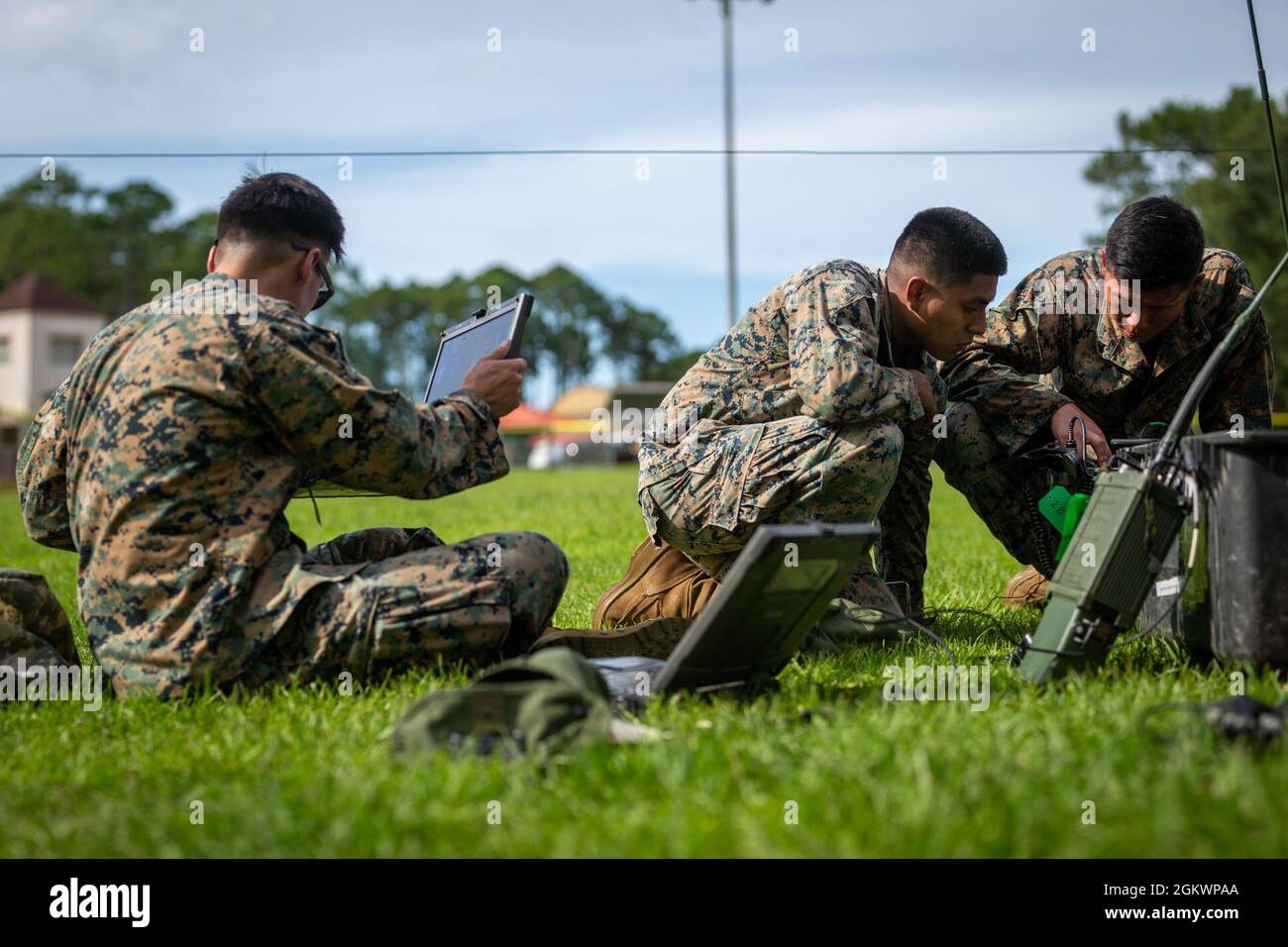 U.S. Marines with 2d Marine Regiment, 2d Marine Division (MARDIV), set up AN/PRC-160(V) radios as part of the 2d MARDIV High-Frequency (HF) Competition on Naval Submarine Base Kings Bay, Ga., July 12, 2021. The competition enhanced HF transmission proficiency and capabilities to prepare Marines for future expeditionary conflicts where the area is either contested or degraded. Stock Photo