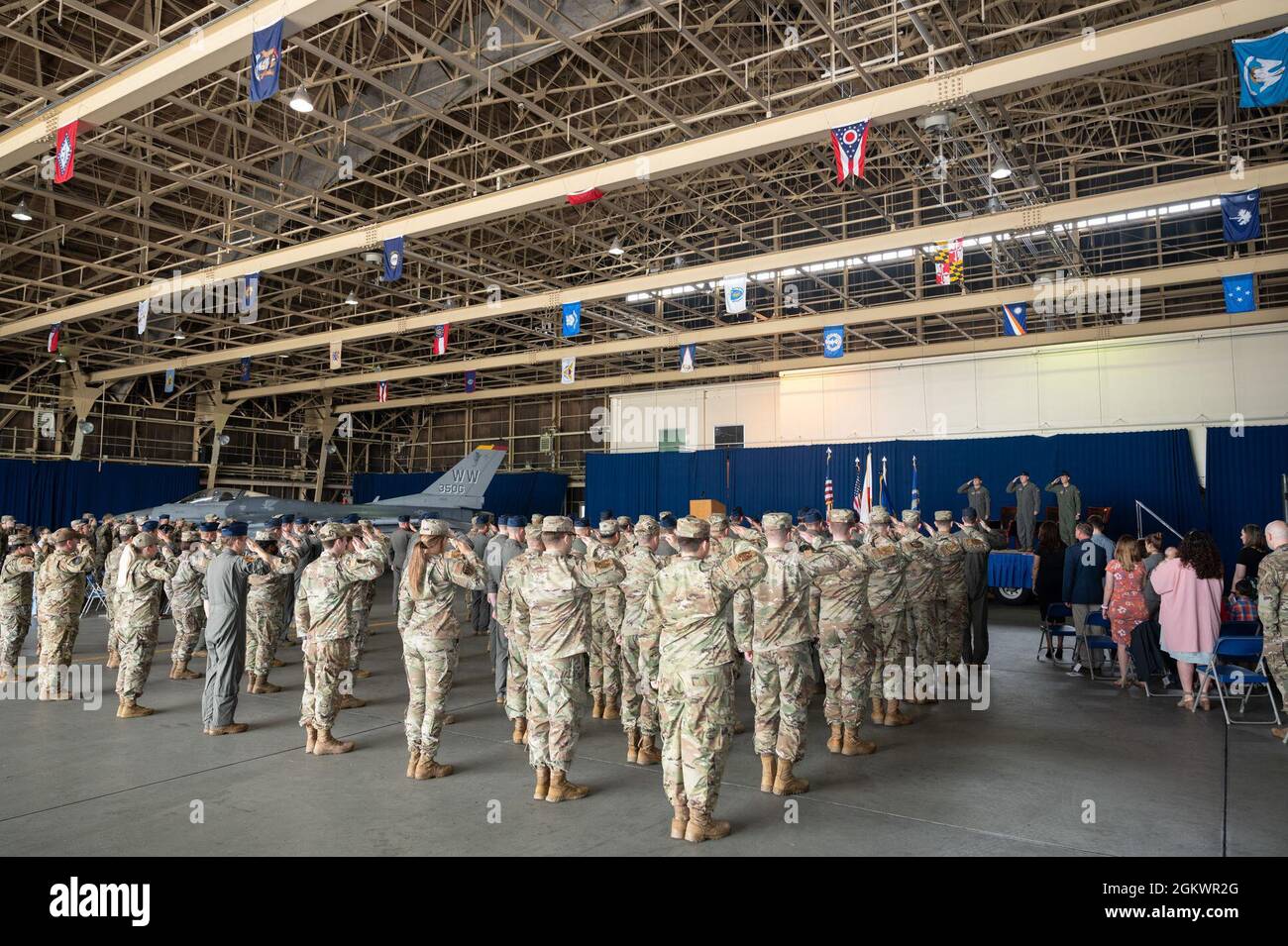 U.S. Airmen with the 35th Operations Group (OG) salute the official ...