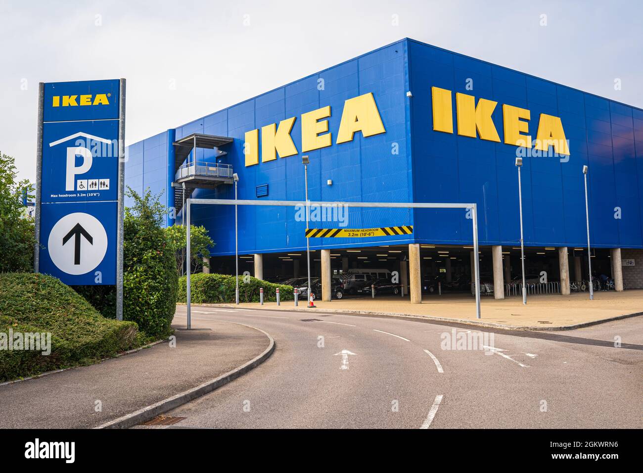 IKEA home furnishings store building exterior, blue facade with yellow sign logo. Cardiff, Wales, the United Kingdom - September 13, 2021 Stock Photo