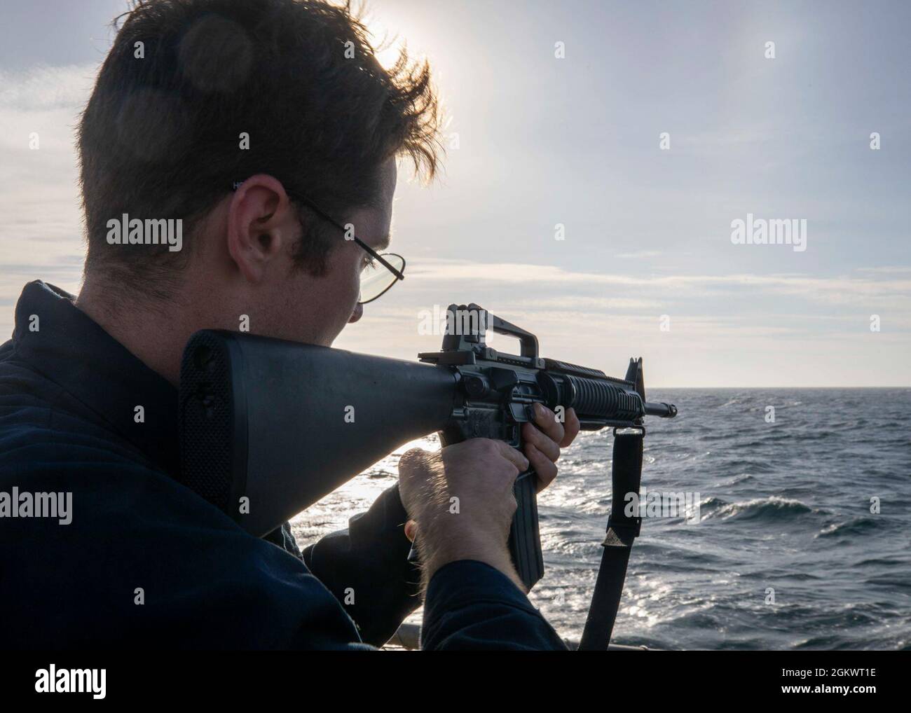 EAST CHINA SEA (July 12, 2021) Fire Controlman 2nd Class Beau Simmons ...