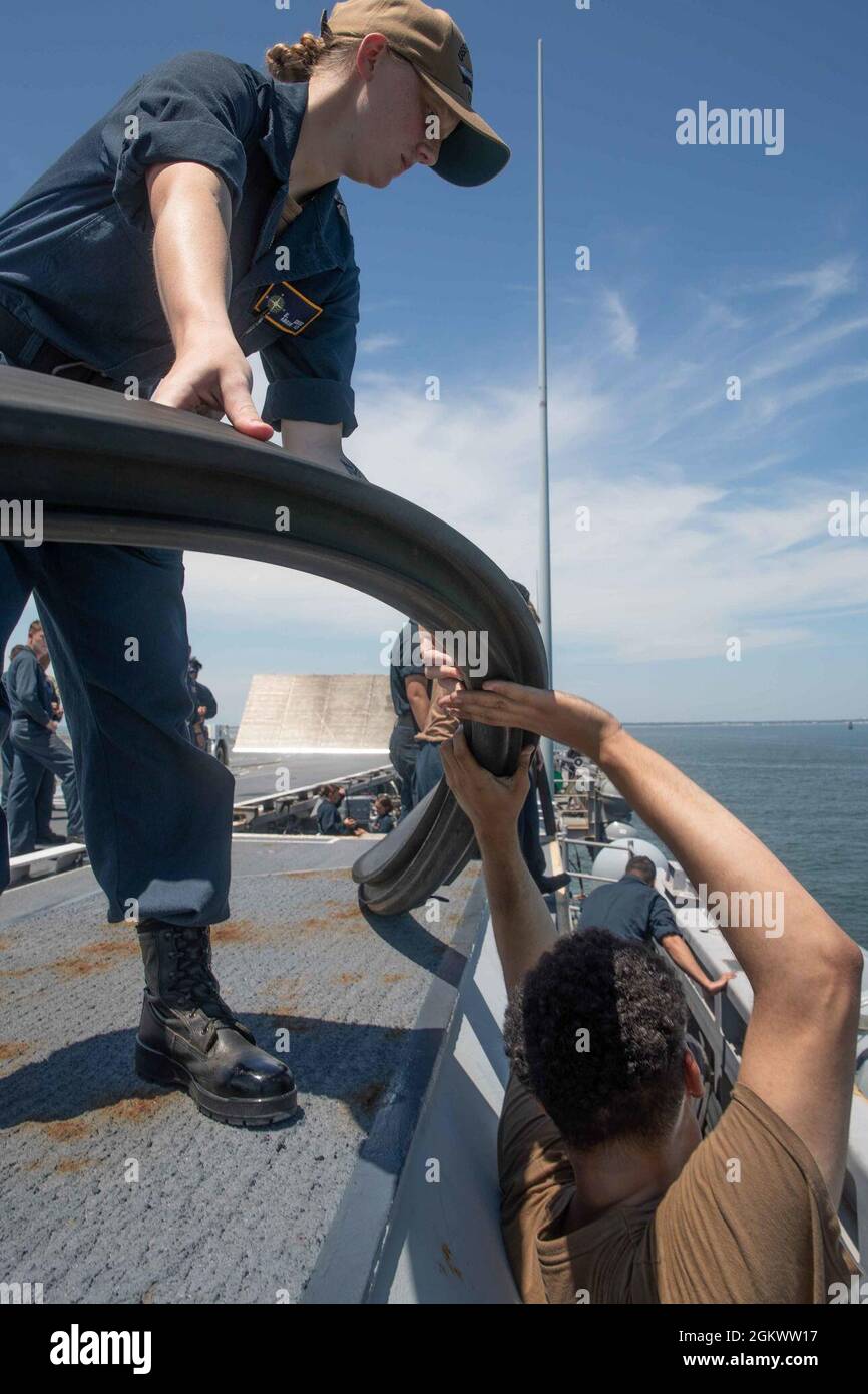 Aviation Boatswain's Mate (Equipment) Airman Apprentice Katelin Kruise, left, from Three Rivers