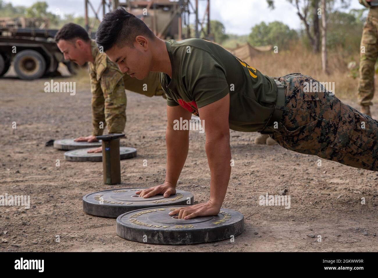 Australian Defence Force Cpl. Jack Goodman-Jones (left), a supply  distribution operator with 7th Combat Service Support Battalion and U.S.  Marine Corps Cpl. Kpru Htoo, a field artillery radar operator with 12th  Marines,