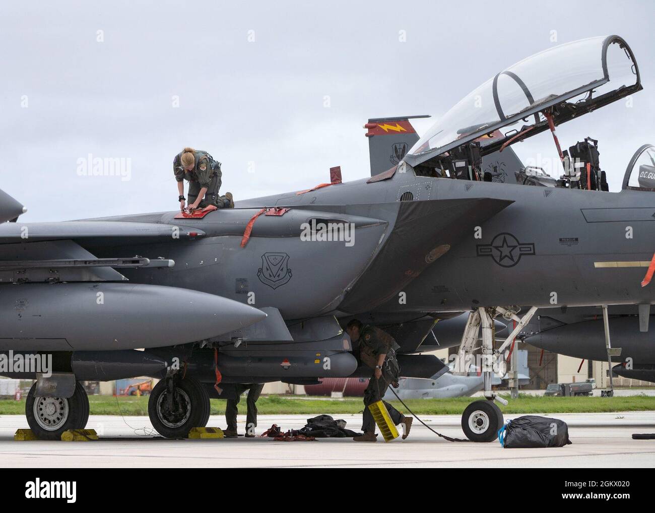 U S Air Force Airmen Assigned To The 3th Fighter Squadron Mountain Home Air Force Base Idaho Conduct A Post Flight Inspection On A F 15e Strike Eagle After Arriving In Support Of Pacific