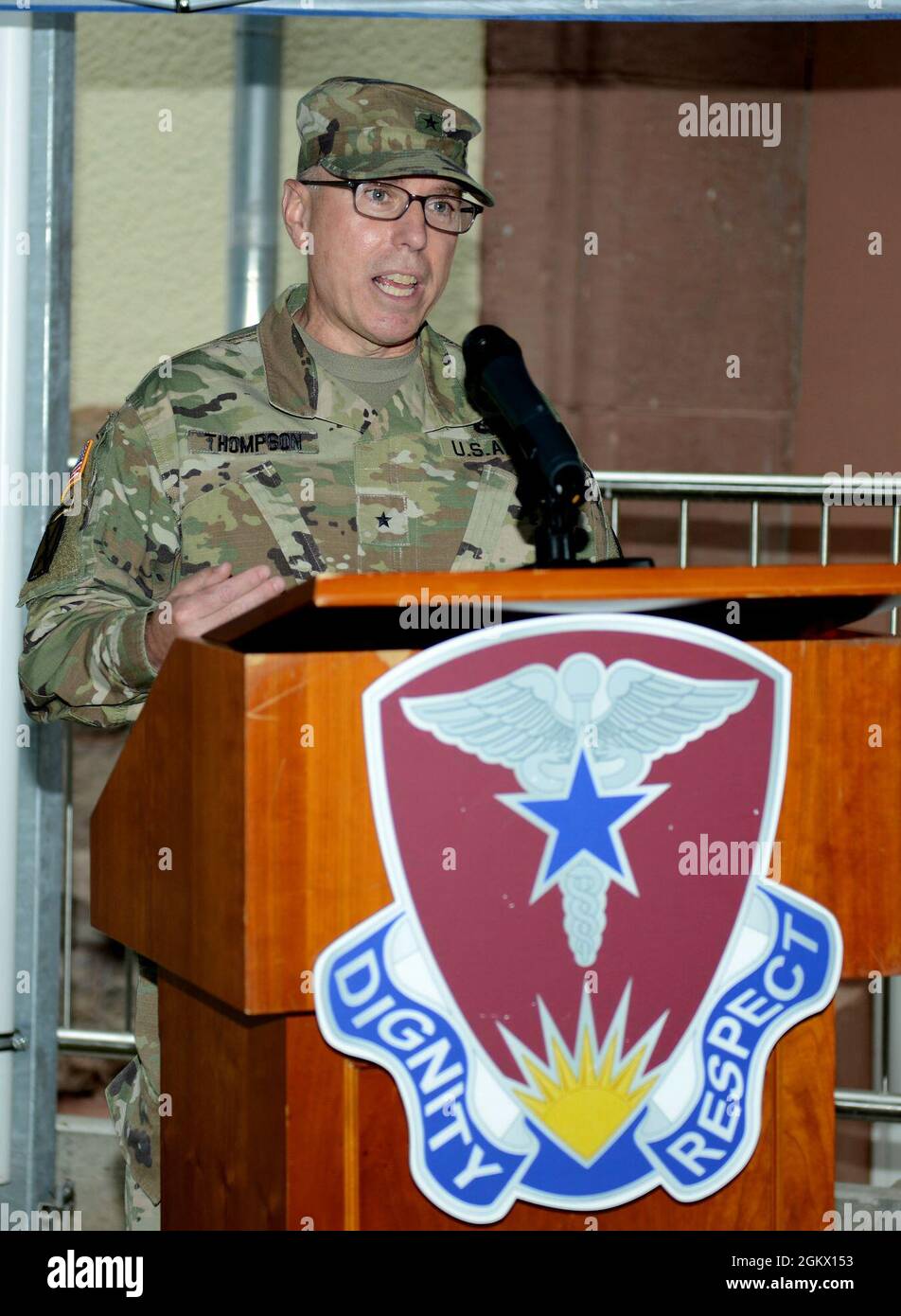 U.S. Army Brig. Gen. Mark Thompson, commanding general of Regional Health Command Europe and command surgeon for U.S. Army Europe and Africa, provides remarks at the ribbon cutting ceremony for the new Specialty Dental Clinic at Landstuhl, Germany July 14, 2021. The new dental facility will provide general dentistry, periodontics, endodontics, prosthodontics, orthodontics, and pedodontics. Stock Photo