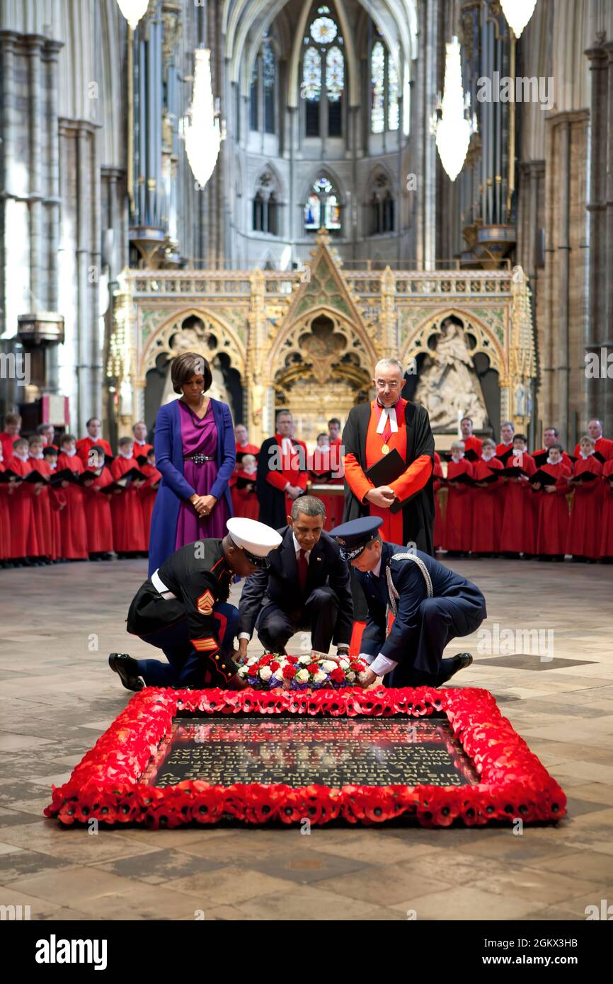 President Barack Obama, assisted by members of the U.S. military, lays a wreath at the Grave of the Unknown Warrior at Westminster Abbey in London, England, May 24, 2011. (Official White House Photo by Pete Souza) This official White House photograph is being made available only for publication by news organizations and/or for personal use printing by the subject(s) of the photograph. The photograph may not be manipulated in any way and may not be used in commercial or political materials, advertisements, emails, products, promotions that in any way suggests approval or endorsement of the Pres Stock Photo